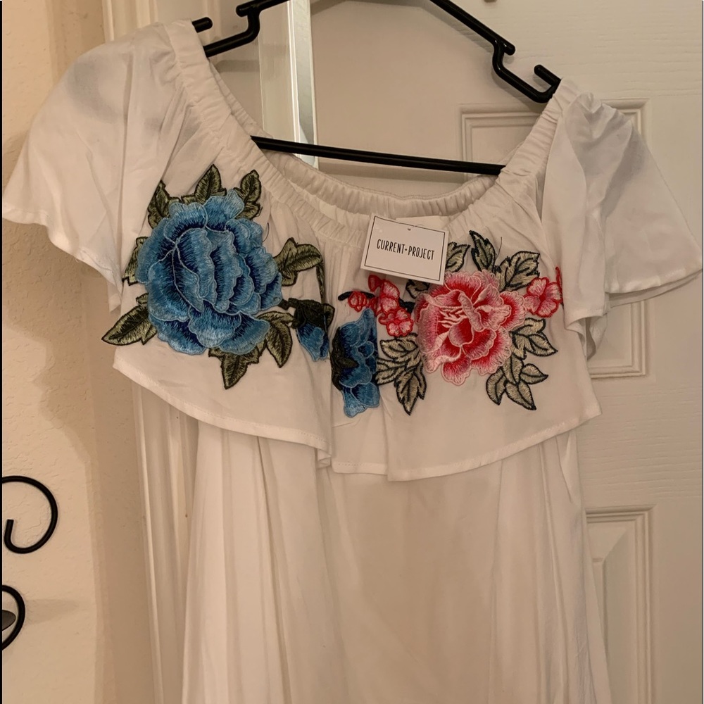 Off the shoulders mini dress.